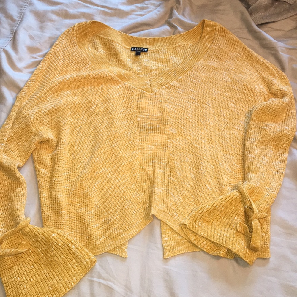Yellow bell sleeve sweater.